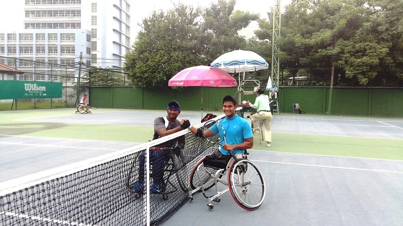 Shiva and the Malaysian No. 1 after a match