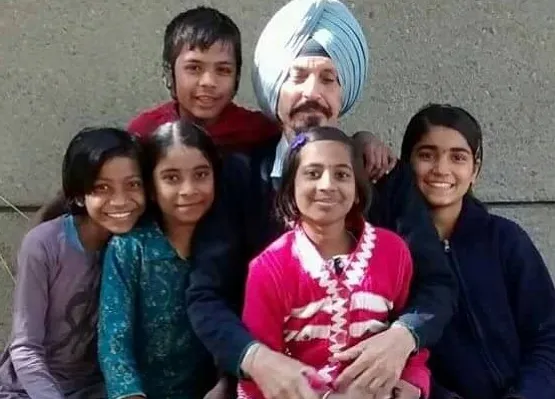 JD Khurana with the kids at his School