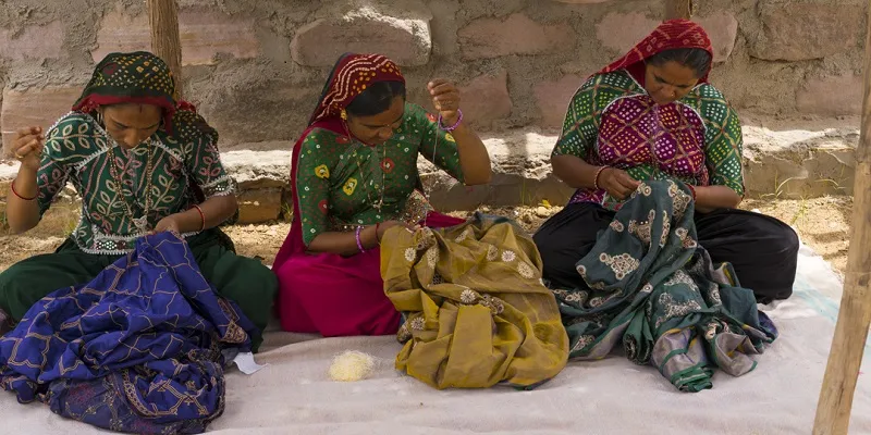 Women doing embroidery 1
