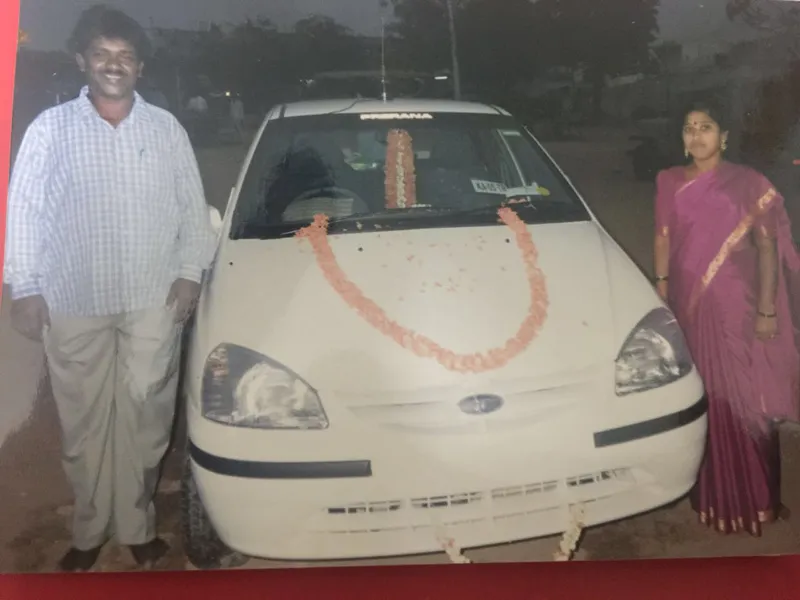 Renuka with his wife and the first car he bought.