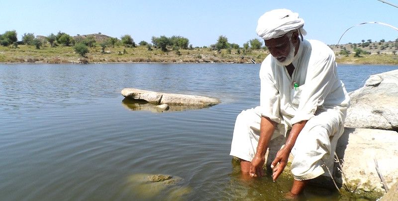 With no govt help coming his way, this farmer sells his land to build a dam to fight drought