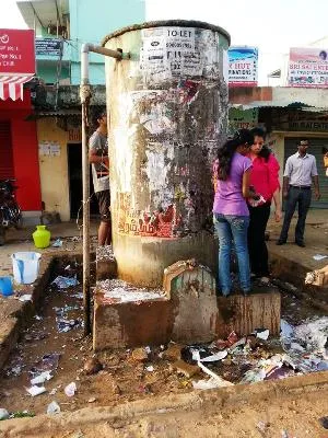 College students clean up an area in Whitefield