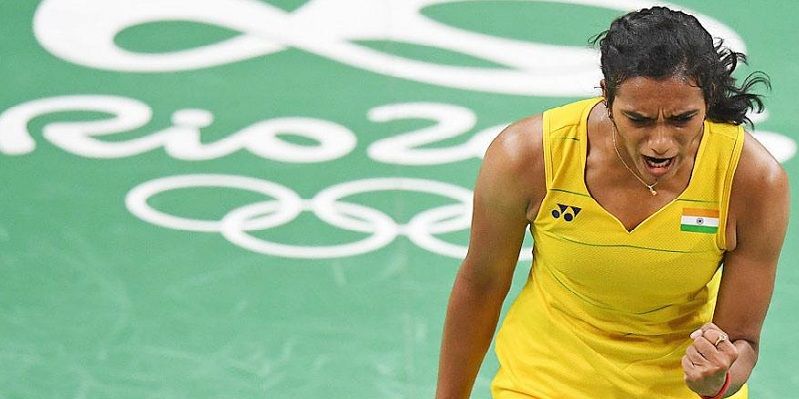 P V Sindhu becomes first Indian shuttler to enter finals, seals medal for country