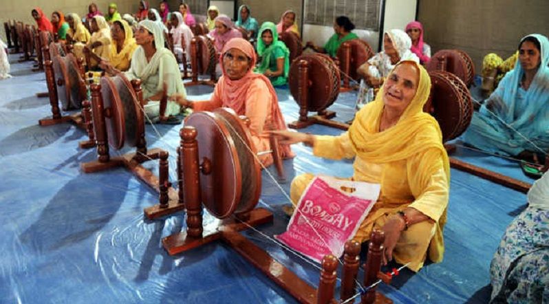 500 charkhas spin tales of economic freedom for 500 Punjab women villagers