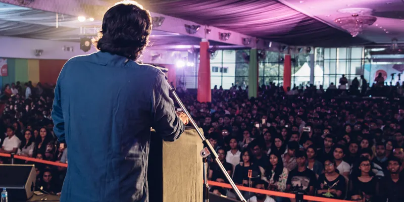 Arnab addressing a packed hall of youngsters. (Pic courtesy Under 25 summit)