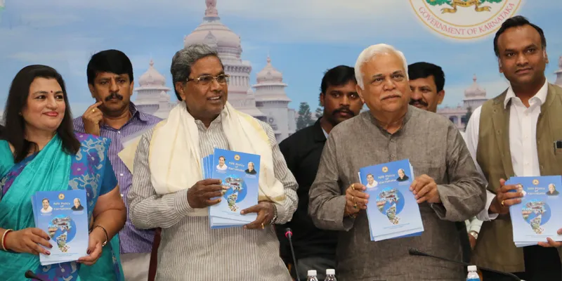 (from left to right) Arathi Krishna, deputy chairman, NRI forum Karnataka, Chief Minister Siddaramaiah, Industries Minister RV Deshpande and IT and Tourism Minister Priyank Kharge 