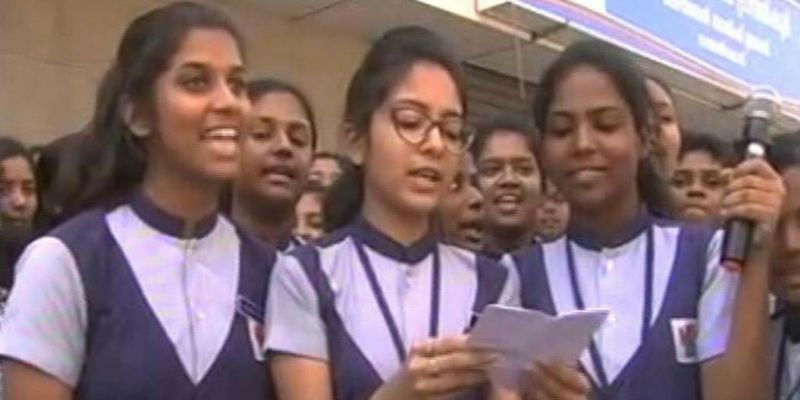 Girls from Holy Angels Convent in Kerala close down a liquor store near their school