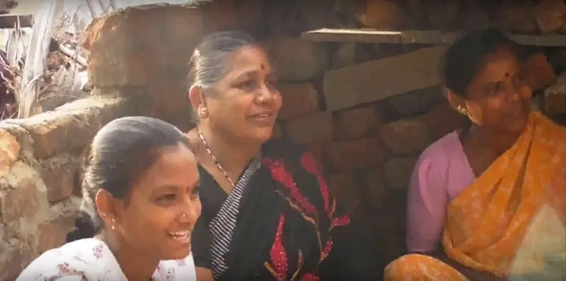 women listening to letter from Jagriti