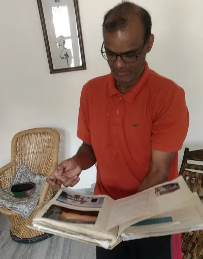 Krishnan showing the photo album