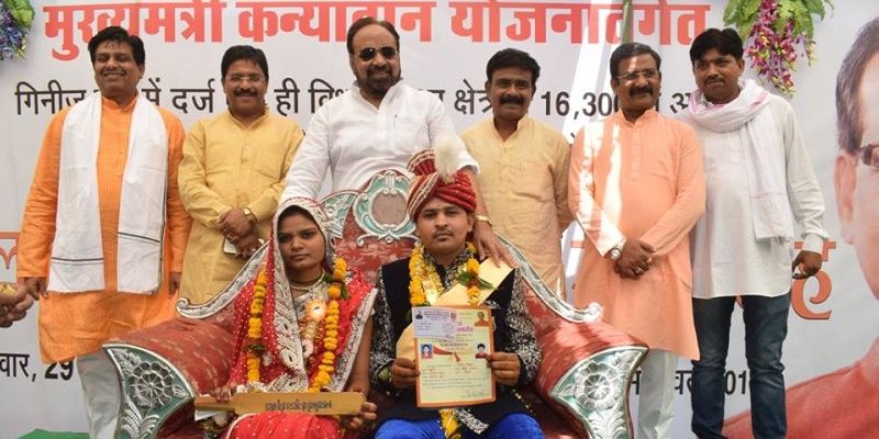 MP minister gifts bats to brides at mass wedding for reforming their husbands