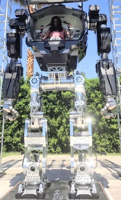 Anima trying a giant robot at the exclusive MARS conference, organized by Jeff Bezos. The robot was designed by South Korean company HankookMirae Technology and is almost 14 feet tall.