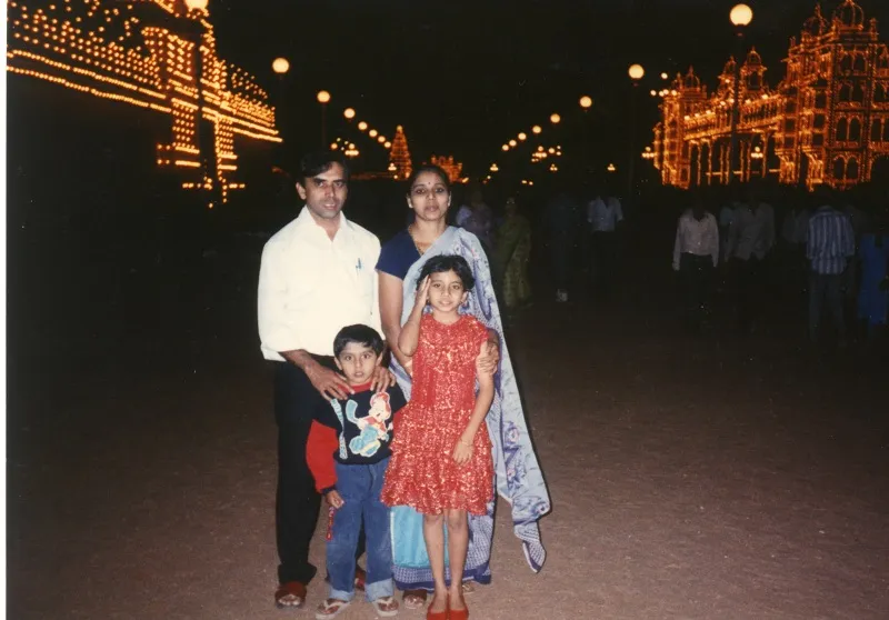 Anima with her family in front of the Mysore palace