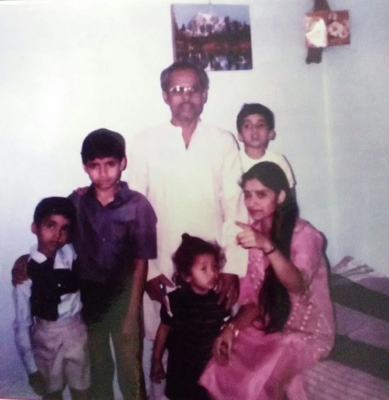 Childhood pic with parents and siblings