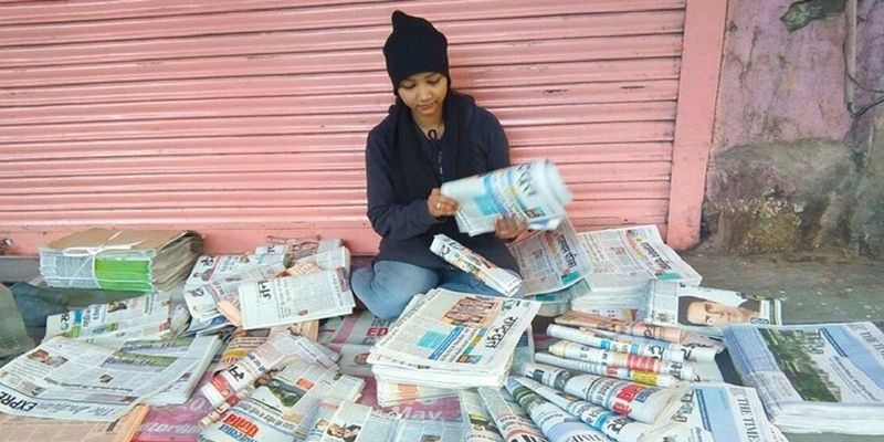After father's death, this young girl sold newspapers to support family