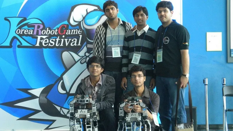 Akash with other AcYut team members at Korea robot game festival