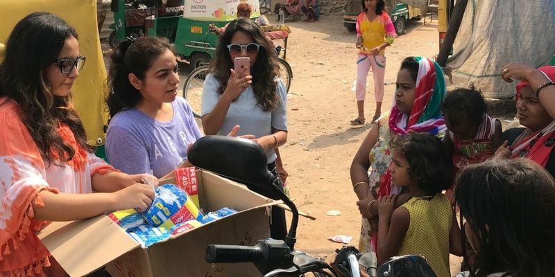 These college girls distribute free sanitary napkins to poor women to create awareness
