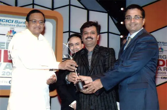 Sanjay and Kailash with Emerging India award