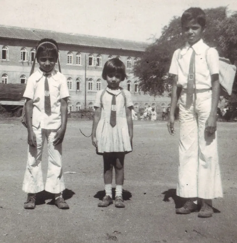 Sanjay with his brother and sister in his school