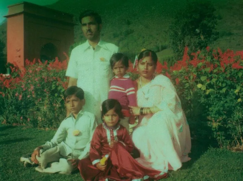 With parents and siblings