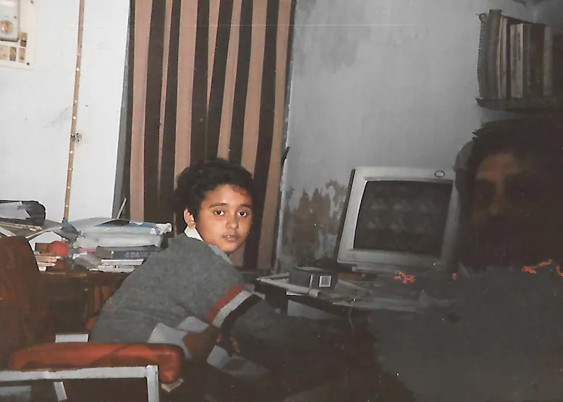 Priyadarshi with his computer in 1993