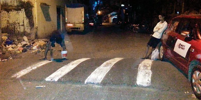 Following senior journalist's road accident, youngsters paint speed breaker to provide visibility at night