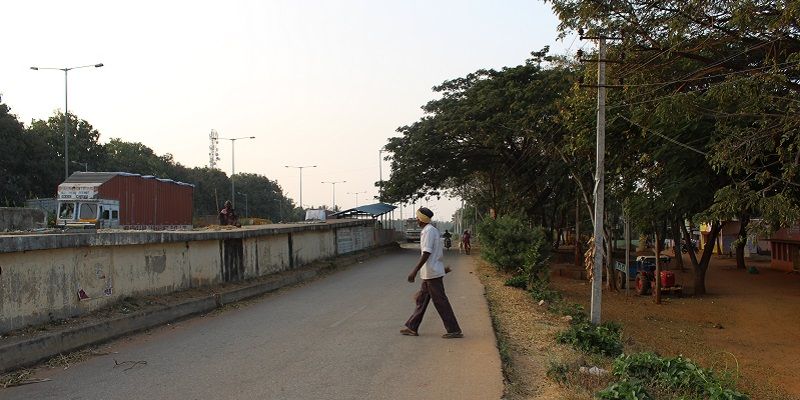 The story of a village that is spread on both sides of a national highway