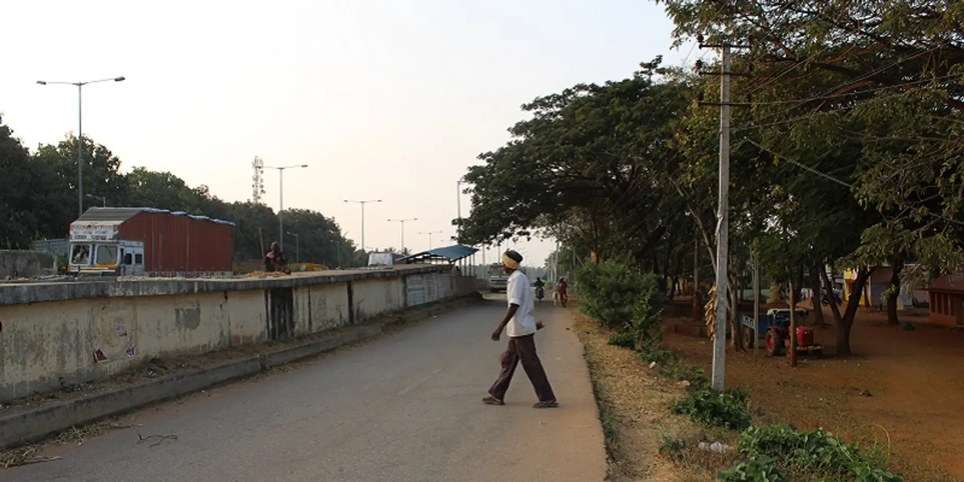 The story of a village that is spread on both sides of a national highway
