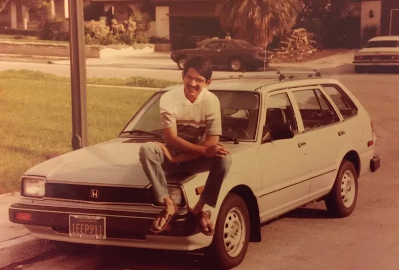 A sunny day in America - Rajiv poses with his car in Sunnyvale