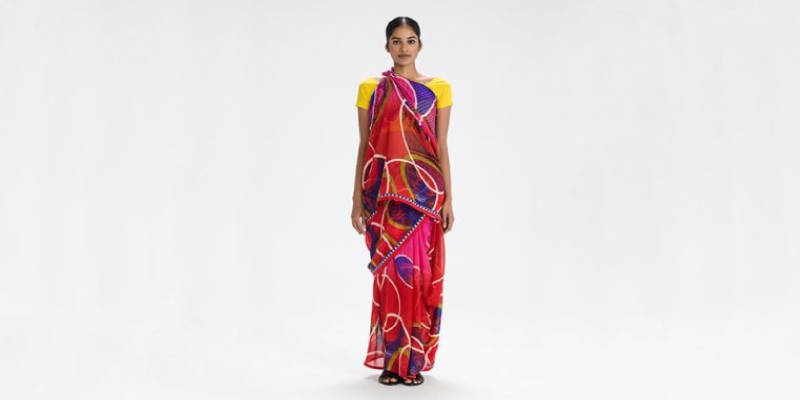 There Are Over A Hundred Ways To Drape Saris, But This One Became