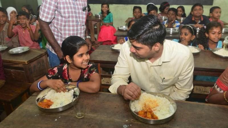 District collector in Kerala shares meal with students, wins hearts