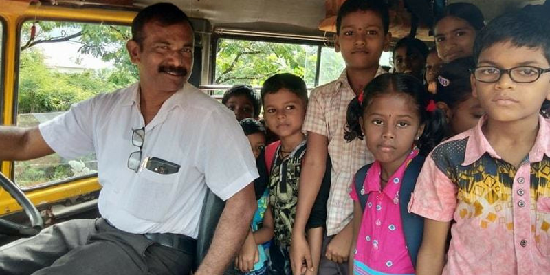 To ensure fewer dropouts, this Udupi teacher bought a bus and drives students to school
