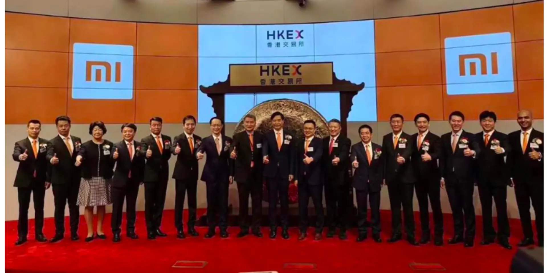 Xiaomi debuts on Hong Kong stock exchange, IPO valuation cut to half