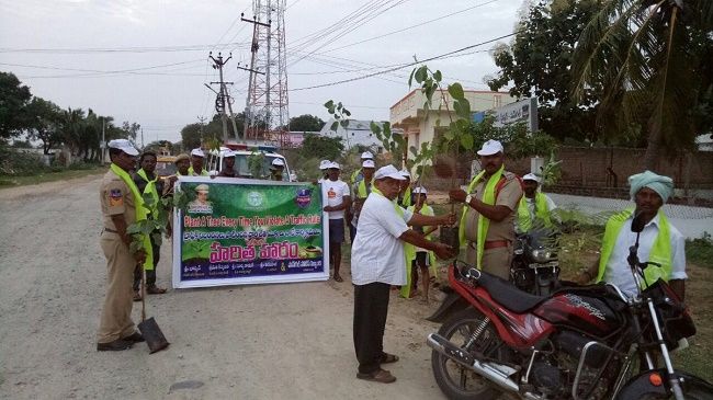This Telangana cop tackles traffic violators by making them plant trees