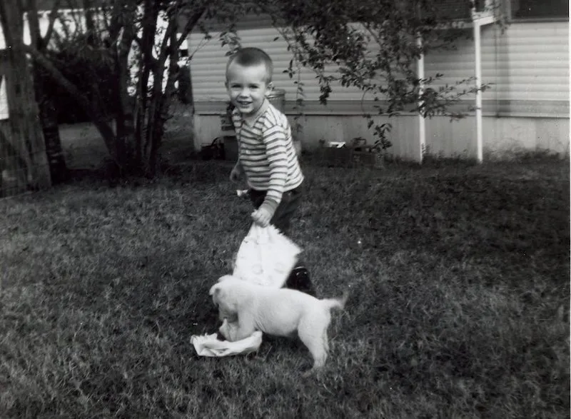 Neal at the age of 3, with his puppy