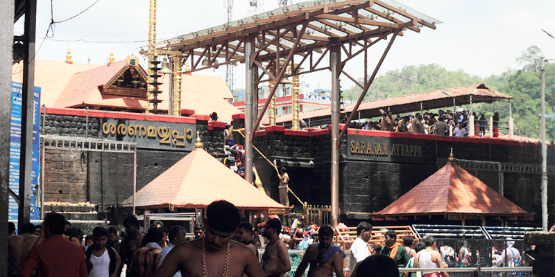 Devotees protest as 11 women try to trek Sabarimala temple