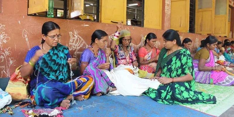 Lambani women doing embroidery