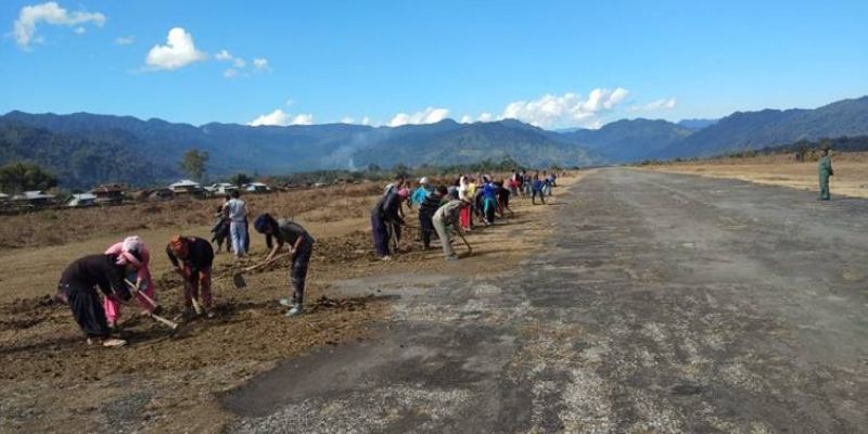 Helping hands: Residents from 11 Arunachal villages come forward to help Indian Air Force repair damaged airstrip