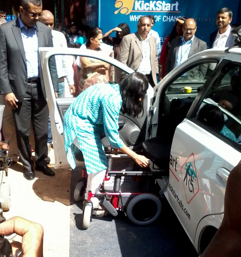 Vidya Ramasubban, chief visionary of KickStart Cabs, demonstrating how a modified vehicle works