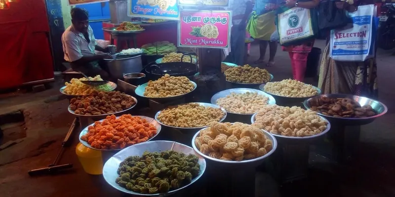 Figure 2 Fresh Murukku sold on the street in Madurai. Which one do you want?