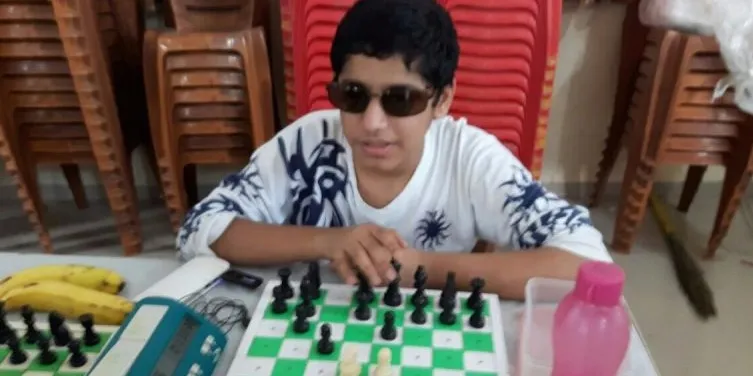 Aryan playing chess