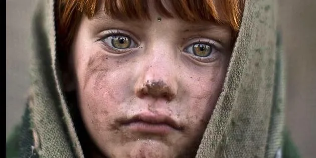 A very rich 8 years old kid from north of Afghanistan in winter from a very poor family, he is rich because he has big dreams in mind,