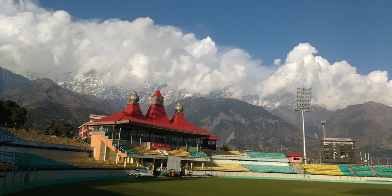 Image Source: https://upload.wikimedia.org/wikipedia/commons/c/c7/Dharamshala_Cricket_Stadium_Landscape.jpg