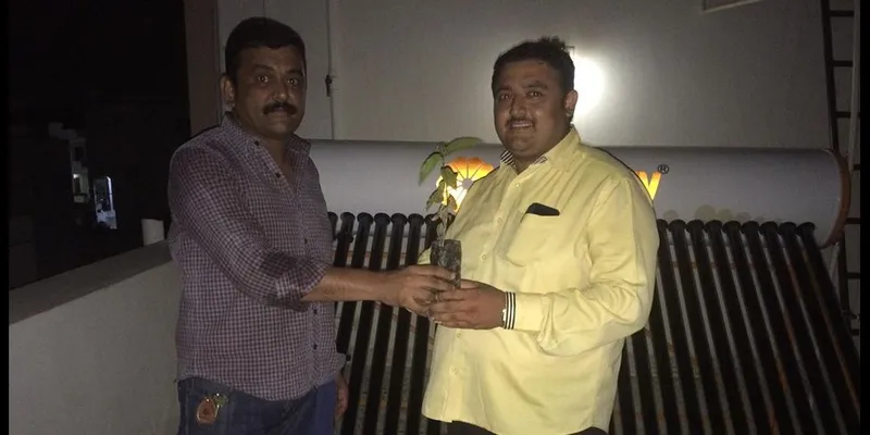 Gifting Plant sapling to our Client Mr.Rupesh Soni, on installation of Solar Water Heater at his Residence in Gandhidham.