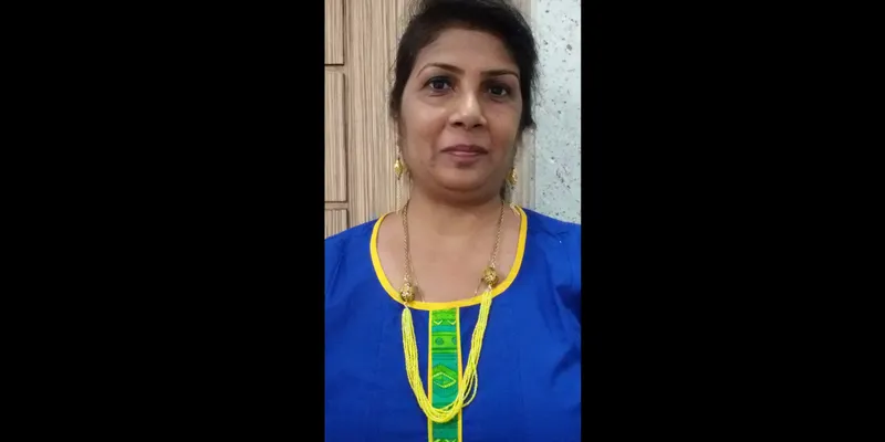 Josephine &nbsp;Allan wearing her latest self-made jewellery, titled,'Sun burst'...neckpiece and coordinated danglers