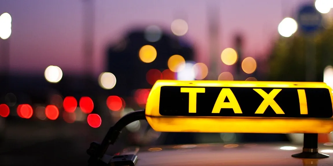 What are the benefits of building a taxi booking app?